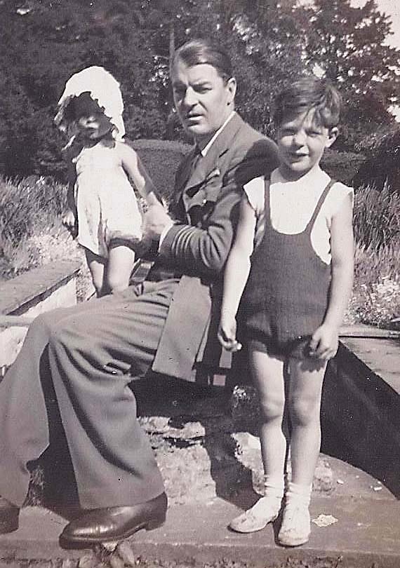 Father with kids wtr gdn P